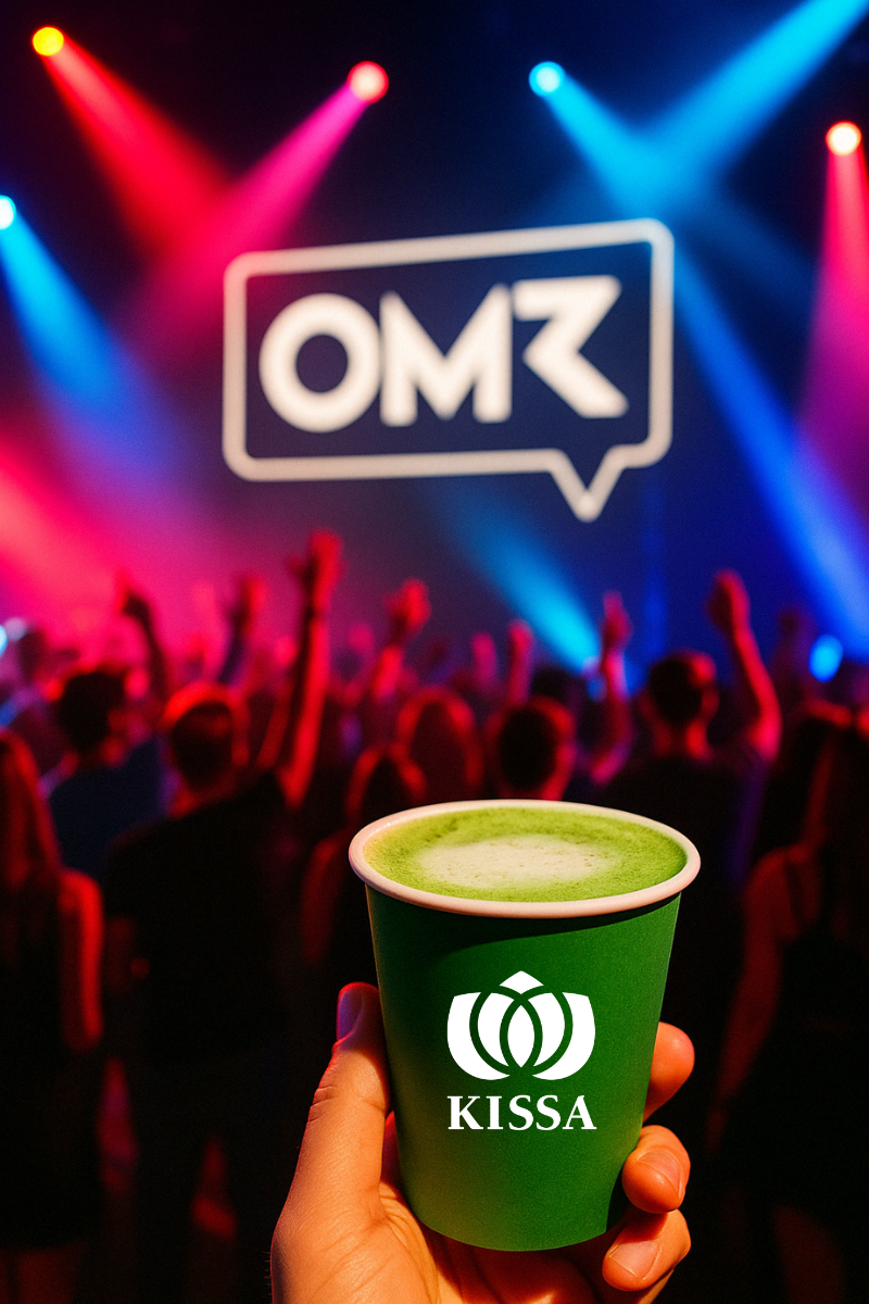 A person holding a matcha latte in OMR event
